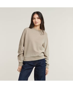 Ribbed neckline. Ribbed cuffs and waist. Gathered seam at the elbow, creates pleats. G-Star RAW rivet at the chest. No closure. Sweater Sleeve Construction is cut in a straight fit and offers raglan sleeves. Volume is created in the sleeves, where a gathered seam at the elbow creates pleats. A ribbed finish adds to this comfortable piece. 100% Organic cotton. Built-in stretch. Knitted sweat fabric