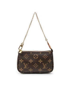 Louis Vuitton Accessoires Mini Pochette Accessoires  Buidel in de Bruin Gecoat canvas in de Gouden Messing  hardware. Het product is in In Perfecte Staat (AA).
  Afmetingen: 15x10x2 cm 
  Inclusief accessoires: None
  
  BrandCo Paris vindt zeldzame artikelen in de beste staat voor ongelooflijke prijzen. Het is de moeite waard om geduldig te zijn! Koop met vertrouwen: alle artikelen van BrandCo Paris worden zorgvuldig geselecteerd en geverifieerd door ons team van experts.

  Alle artikelen worden geleverd met een certificaat van echtheid en verpakt door BrandCo Paris.

  Classificatietabel voor de conditie van het artikel:

  N (als nieuw)
  AA (perfecte staat)
  A (uitstekende staat)
  AB (zeer goede staat)
  B (goede/redelijke staat)
