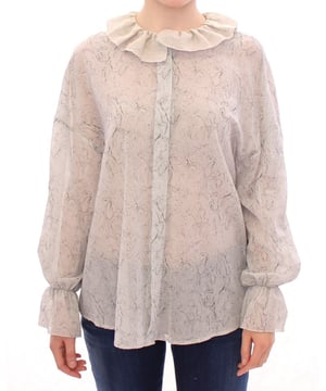 Marca: Vika Gazinskaya.
  Modelo: Blusa Tunica.
  Color: Azul.
  Material: 100% algodon.
  Cierre frontal completo con botones.
  Mangas largas.
  Detalles del logotipo.