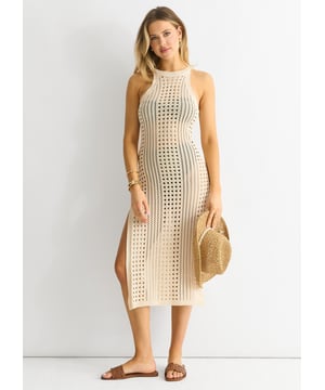 Ervaar moeiteloos comfort en stijl met onze Beige Crochet Knit Bodycon Slit Dress. Gemaakt van zacht, ademend materiaal, omhelst het gebreide ontwerp je rondingen terwijl de split een vleugje allure toevoegt. Perfect voor elke casual gelegenheid, deze jurk is een must-have in je garderobe.