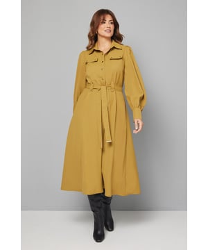 Elegant midi dress crafted from lightweight crepe fabric for comfortable all-day wear
        Sophisticated collared neckline with button-through front design for classic appeal
        Statement balloon sleeves with neat cuffs adding a contemporary touch to a timeless silhouette
        Practical chest pockets providing both style and functionality
        Flattering belted waist that cinches and defines your figure beautifully
    
    This versatile Wallis midi dress combines sophistication with everyday wearability. The flowing crepe fabric drapes elegantly while the belted waist creates a flattering silhouette that works for various body types. Style with knee-high boots as shown for an effortlessly chic daytime look perfect for lunch dates or family gatherings. For a more casual approach, pair with white trainers and a denim jacket. The practical pocket details and comfortable fit make this an ideal choice for busy days when you need to look polished without sacrificing comfort. Transition from day to evening by swapping boots for ballet flats and adding statement earrings. This dress will quickly become a cornerstone of your wardrobe, offering endless styling possibilities throughout the seasons.