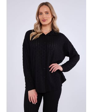 Elevate your occasion wear with our Black Textured Oversized Long Sleeves Shirt. The oversized fit and textured fabric provide a chic and effortless look. Perfect for any formal event, this shirt is a must-have in your wardrobe. Make a statement with this versatile and stylish piece!