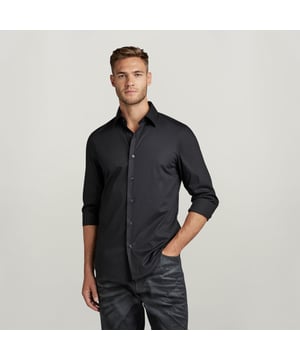Shirt collar. Cuffs- adjustable button closure. Slightly curved hem. Shoulder panel. G-Star RAW embroidery at the hip. Button closure. This shirt is made from poplin with a crisp look and just the right amount of stretch. 97% Cotton, 3% LYCRA® Elastane. Lighter weight. Super Slim