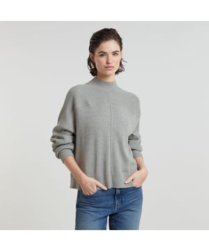 Ribbed mock neck. Shoulder panel proceeds in upper arm panel. Ribbed cuffs and waist. Vertical stripe in 3D at the front and back. Woven G-Star Originals label at the lower front. Zip closure. Boxy Jumper Mock offers a relaxed, loose fit in a shorter length. The ribbed section on the shoulder proceeds in an upper arm panel. The 3D stripe at the front and back adds interest. 95% Cotton, 5% Cashmere. Built-in stretch. Loose