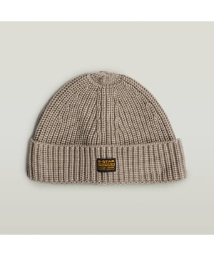 Knitted beanie. Seaming at the top for perfect fit. Woven G-STAR Originals label at fold over. No closure. Fisherman beanie Originals offers a shorter design with a fold over edge. A woven G-STAR Originals patch is set at the front. 60% Viscose LENZING™ ECOVERO™, 40% Cotton. Built-in stretch. Knitted