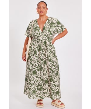 - Tropical print - V-neck - Wrap front look - Ruched waistline - Model height: 5'6" - Model wears uk 18 / us 14 / eur 46 - Always check the wash care label - Cool hand wash with mild detergent