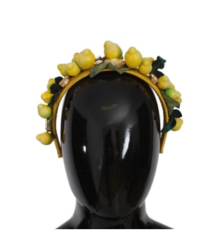 100% authentisches Dolce & Gabbana Diadem.
  Diadem mit Stirnband.
  Leuchtende Farbkombination in Gelb und Grun mit Zitronen.
  Sizilien.
  Motiv.
  Gefertigt aus einer Mischung aus Seide Kristall Messing und anderen Materialien.
  Champagner und klare Kristalle.
  Einheitsgrosse mit Logo.
  Details.
  Hergestellt in Italien.
