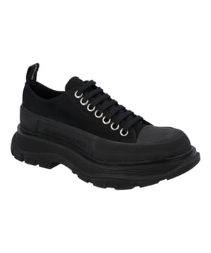 - Canvas lace-up shoe with a thick, oversized rubber profile sole
- The lace-up features a textured rubber overlay and tonal Alexander McQueen signature, finished with a signature strap at the heel of the shoe
- Round toe shape silhouette details rubber toe cap
- Made In Italy
- SS21