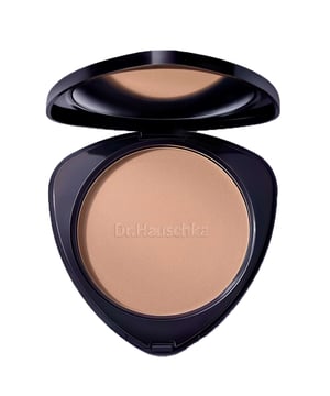 Experience the sun-kissed radiance with Dr. Hauschka Bronzing Powder in 01 Bronze. This 100% natural and organic formula is certified by NATRUE and is free from synthetic fragrances, dyes, and preservatives. Perfect for sensitive skin, it features soothing botanical ingredients like witch hazel and sage, ensuring a comfortable application. The sheer powder provides a translucent bronzed effect, enhancing your natural beauty while nourishing your skin. Radiate vitality and embrace a healthy glow with this eco-friendly bronzing powder, ideal for everyday use.