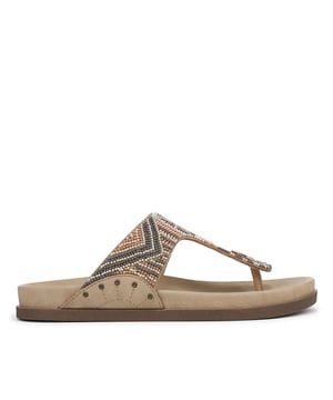 Womens Blowfish Malibu Lyric Embellished Sandals in sand.Beaded sandal with toe post.- Slip on design.- Bead-embellished faux leather upper.- Comfortable textile lining.- Contoured footbed.- Vegan- Synthetic and textile upper  Textile lining  Synthetic sole.- Ref: J3464S1250
