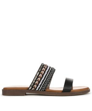 Womens Blowfish Malibu Curtis Embellished Slide Sandals in black.Faux leather slide sandals with intricate bead  sequin and embroidery detailing.- Slip on two-bar design.- Faux leather upper with decorative embellishments- BLOOM Foam insole for cushioned comfort- Vegan- Synthetic and textile upper  Textile lining  Synthetic sole.- Ref: J4237F1002