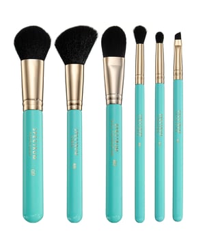 Elevate your beauty routine with the Spectrum New York Travel Brush Set, featuring six essential brushes designed for on-the-go glam. This thoughtfully curated set includes the A03 oval foundation brush for a flawless base, the C07 complexion brush for sculpting, and the A05 cheek brush to add a pop of color to your cheeks. Blend your eyeshadow seamlessly with the B06 blending brush, define your eyes with the A12 fluffy pencil, and achieve precise brows or winged liner with the A17 angled definer. Perfect for any makeup enthusiast!