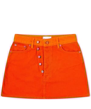 • Brand: GANNI
 • Material: 100% Organic Cotton
 • Design: The GANNI Overdyed Cutline Denim Double Fly Mini Skirt in vibrant Orangeade delivers a fresh and bold take on classic denim. Distinctive double fly detailing adds a modern twist, enhancing the skirt’s edgy yet playful character
 • Colour: Orangeade
 • Style: This piece is a standout statement for casual and streetwear-inspired looks