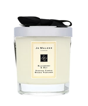 Experience the exquisite aroma of the Jo Malone Blackberry & Bay Candle, a perfect blend of fruity and floral notes. Launched in 2012, this luxurious candle features a vibrant top note of ripe Blackberry, harmonized with the earthy essence of Bay Leaves and grounded by a warm Cedarwood base. Designed to enhance your space, it burns for up to 45 hours and comes elegantly packaged with a decorative lid and bow. Dimensions: H9.2 x W7.5cm. Perfect for gifting or treating yourself to a fragrant escape.