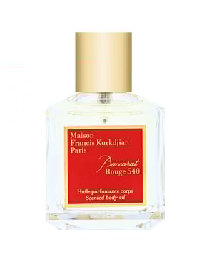 Indulge in the exquisite Maison Francis Kurkdjian Baccarat Rouge 540 Scented Body Oil. This luxurious body oil envelops your skin in an intoxicating fragrance that blends earthy woods with rich amber. The top notes of saffron and jasmine create a fresh and alluring aroma, while the heart reveals comforting amberwood and ambergris. Finally, the base notes of fir resin and cedar provide a warm, sophisticated finish. Perfect for women who appreciate elegance and refinement, this 70ml body oil is a must-have addition to your bath and body collection.