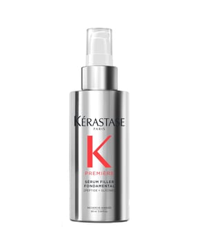 Transform your hair care routine with Kérastase Première Anti-Frizz Reparative Filler Serum. This leave-in treatment repairs and protects hair from breakage while combating frizz. Infused with innovative ingredients, it seals hair strands for a glossy finish and enhances strength against heat styling. Perfect for women seeking manageable hair, this serum reflects Kérastase's commitment to sustainability with recyclable packaging. Enjoy luxury and responsibility in your hair care. Volume: 90 ml.