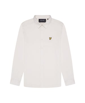 Kraag met knoopsluiting.Lange mouwen met knoopmanchetten.Volledige knoopsluiting.Lyle And Scott Golden Eagle geweven logobadge geborduurd links op de borst.Normale pasvorm.