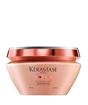 Transform your hair with the Kérastase Discipline Maskeratine, an advanced anti-frizz hair masque designed for women. This luxurious 200 ml treatment features a pro-keratin formula that restores hair integrity, enhancing fluidity and manageability. Perfect for unruly hair types, it repairs from within, providing a smooth surface for effortless styling. Simply apply to clean, damp hair, leave for 5 minutes, and rinse thoroughly. Kérastase is dedicated to sustainability, utilizing recycled materials and achieving carbon neutrality in production. Experience the art of hair care with Kérastase.