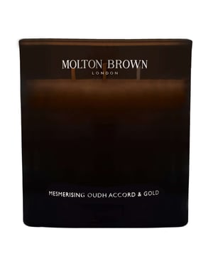 Experience the enchanting scent of the Molton Brown Oudh Accord & Gold Candle, a luxurious addition to any space. Launched in 2015, this captivating fragrance features top notes of cinnamon leaf, nutmeg, and bergamot, blended with heart notes of elemi, myrrh, and black tea. The base notes of oudh, vetiver, and honey create a warm and inviting atmosphere. This cruelty-free candle, approved by Leaping Bunny, is perfect for gifting or indulging yourself. Enjoy its 600g size for long-lasting fragrance.