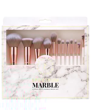 Elevate your makeup game with the Spectrum Marbleous 12 Piece Makeup Brush Set. This exquisite collection features a stunning blend of white marble, rose gold, and grey tones, perfect for any beauty enthusiast. The set includes 5 luxurious face brushes and 7 of Spectrum's most popular eye, brow, and lip brushes, making it an ideal choice for both professional makeup artists and passionate makeup lovers. Start building your professional-grade brush collection today and achieve a flawless, blended finish with every application.