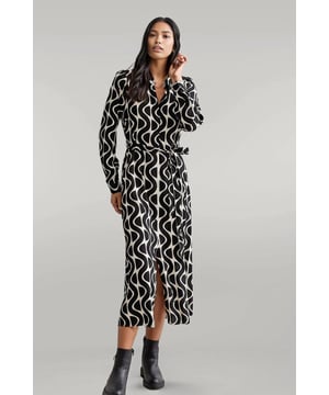 Designed in a retro monochrome print, turn heads on every occasion in this black geometric dress. Cut to a versatile shirt shape, it works for coffee catch-ups to cocktail-sipping evenings.
Soft Woven Viscose Fabric
Collared
Length: Midi
50" Shoulder to Hem
Long Sleeve
Sizing: As expected 
Fit: Relaxed Fit.