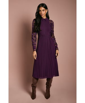 Exquisite lace detailing on sleeves and bodice
        Elegant collared neckline with button-up front
        Fitted waist with pleated skirt for a flattering silhouette
        Long sleeves for sophisticated coverage
        Midi length perfect for formal occasions
    
    This stunning lace shirt dress from Coast embodies refined elegance, perfect for those special occasions where you want to make a lasting impression. The intricate lace pattern adorning the sleeves and bodice adds a touch of romance and sophistication, while the collared neckline and button-up front offer a classic, tailored look. The fitted waist cinches in to create a feminine silhouette, flowing into a beautifully pleated skirt that falls to a graceful midi length. Ideal for weddings, the races, or any formal event, this dress can be styled with strappy heels and delicate jewellery for a polished ensemble. For cooler evenings, layer with a sleek blazer or wrap to maintain your elegant appearance. The versatility of this piece allows for effortless transitions from day to night, ensuring you remain the epitome of sophistication throughout any occasion.