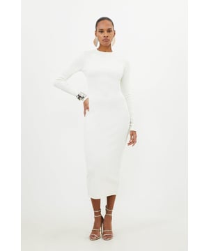 This staple piece is crafted with figure-forming jersey fabric for a sleek and sculpted look. Ribbed detailing adds a textural element while a round neck and long sleeves ensure a sophisticated mood. Style this maxi dress with strappy heels or boots to complete the look.Jersey ribbed fabricHigh neckLong sleevesMaxi dressDiscover this seasons jersey dresses or browse the full collection of women's dresses now.