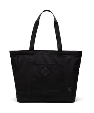 A timeless tote. Made with recycled fabrics and our signature diamond detail, this large tote is packed with organizing features that carry you through work, travel and everyday journeys.