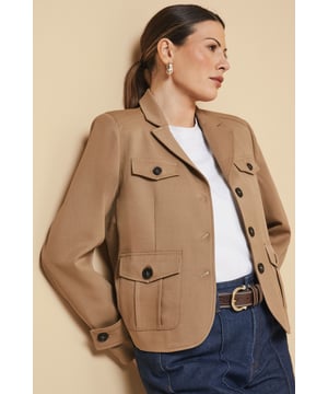 Structured utility jacket featuring four practical front pockets with button closures
        Classic collared neckline with smart lapels for a sophisticated silhouette
        Button-through front fastening with contrasting buttons for added detail
        Tailored regular fit with slight stretch for comfortable all-day wear
        Neat cuff detailing with button accents for a polished finish
    
    This versatile Four Pocket Utility Jacket from Wallis combines practicality with sophisticated style. The structured silhouette offers a flattering shape whilst maintaining comfort through its regular fit and slight stretch. Style with wide-leg denim trousers and a simple white tee for an effortlessly chic daytime look, perfect for weekend brunches or casual shopping trips. Add a leather belt to define the waist and complement with ankle boots for a coordinated ensemble. The neutral tone makes this jacket an excellent layering piece for transitional weather, working beautifully over lightweight jumpers or simple tops. For family gatherings or lunch dates, pair with tailored trousers and ballet flats for a smart-casual outfit that conveys understated elegance. This jacket will quickly become a cornerstone of your casual wardrobe, offering both functionality and style.