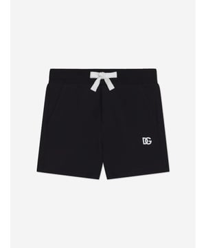 Introduce a touch of Italian elegance to your little one's wardrobe with the Baby Boys Logo Shorts in Navy by Dolce Gabbana. Perfect for SS2025, these shorts blend impeccable style with ultimate comfort. Here's why they're a wardrobe essential Crafted in Italy Meticulously made, ensuring premium quality and durability. Chic Design Emblazoned with the iconic Dolce Gabbana logo for an unmistakable designer touch. Comfortable Fit Soft fabric ensures comfort for all-day play and adventures. Ideal for any Occasion Versatile and stylish, perfect for casual outings or special events.Enhance your child's closet with these luxurious shortsstyle and comfort in one delightful package!