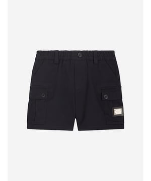 Introducing the exquisite Baby Boys Cargo Shorts in Navy by Dolce Gabbana, a splendid addition to your little cherub's wardrobe for SS2025! Marvel in the Italian craftsmanship stylish flair of this piece Italian Elegance Meticulously tailored in Italy, these shorts promise unmatched quality sophisticated style. Classic Navy Hue The deep blue shade offers versatility and a touch of elegance to any outfit. Comfort Meets Style Designed with your child's comfort in mind, ensuring they look charming without compromising on ease.Perfect for any occasion, these cargo shorts will make your boy the epitome of youthful fashion! Order now to embrace timeless elegance.