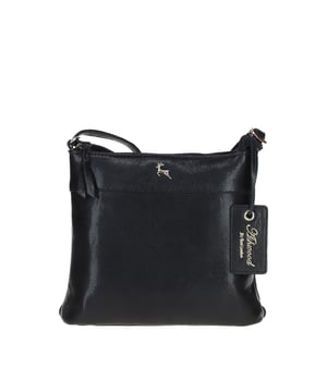 Discover the Ashwood Leather Crossbody Bag, a perfect blend of style and practicality crafted from genuine Ashwood leather. Featuring a main top zip closure, elegant golden hardware, and fully lined interior, this versatile bag offers ample organization with one slip pocket and one zip pocket inside, plus an additional zip pocket on the back. The bag is adorned with an Ashwood leather charm, enhancing its sophisticated look. With dimensions of 21 cm (L) x 6 cm (W) x 20 cm (H) and an adjustable dropdown length ranging from 37 cm to 75 cm, this crossbody bag is ideal for both casual and formal occasions, seamlessly combining timeless design and everyday functionality.