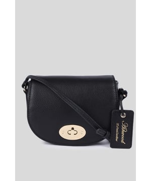 Elegance and sophistication come together in this beautifully crafted 'Borsa della Moda' saddle crossbody bag. Made with genuine leather, it showcases the high-quality craftsmanship associated with Ashwood Leather. Adorned with metallic gold hardware which not only adds to its aesthetic appeal but also ensures durability. The exquisite design makes it a perfect accessory for both day and night outings. Comes with a signature tag, marking its authenticity and brand association. Whether you're headed to a formal event or just out for a casual day, this 'Borsa della Moda' crossbody bag is sure to elevate your style quotient. Its versatile design allows it to be paired with various outfits, making it a must-have addition to your accessory collection.Dimensions (L) 17cm (W) 5.5cm (H) 14cm.