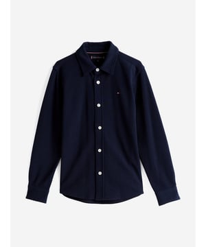 Discover the Boys Micro Waffle Regular Shirt in Navy by Tommy Hilfiger, an impeccable addition to your boy's wardrobe for SS2025. Elegantly designed, this piece merges classic style with contemporary touches. Key features include Exquisite Micro Waffle Texture Delivers a sophisticated look while ensuring breathability and comfort. Classic Navy Hue Versatile and timeless, perfect for any occasion. Superior Craftsmanship Attention to detail in stitching and finishes reflects high-end quality. Elevate your boy's style quotient with this stylish and durable shirt. Shop now!