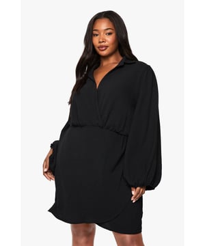 Flattering wrap neckline for a feminine touch
        Voluminous balloon sleeves add drama and flair
        Mini length perfect for showcasing your legs
        Cinched waist creates a defined silhouette
        Versatile woven crepe fabric for day-to-night wear
    
    Embrace effortless chic with this captivating plus-size wrap mini dress from Boohoo. The wrap neckline gracefully frames your dcolletage, while the cinched waist accentuates your curves beautifully. The statement balloon sleeves add a touch of drama, perfect for those who love to make an entrance. Ideal for casual outings or family gatherings, this dress can be easily dressed up or down. Pair it with trendy trainers and a crossbody bag for a laid-back daytime look, or slip on some strappy sandals and statement earrings for an evening out with friends. The mini length is perfect for showing off your favourite footwear, while the woven crepe fabric ensures comfort and style throughout the day. This versatile piece is a must-have addition to any fashion-forward wardrobe, offering endless styling possibilities for the confident, trend-setting Boohoo woman.
