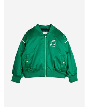 Mini Rodini incorporate environmentally friendly properties into their aesthetics. This unisex chenille satin baseball short jacket is woven in a beautiful lightweight design. Depicted in green with a white musical note print on the front, and a similarly large musical note print on the back. With light padding and practical push-button pockets on each side, it ensures easy dressing and effortless style. Long Sleeves Practical Zipper With Chin Guard Inner Wind Pole Water and Dirt-Repellent Coating 100 Recycled Polyester
