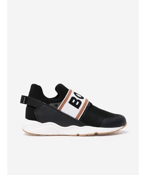 Introducing the BOSS Boys Logo Trainers in Black, the quintessential addition for your young gentleman's SS2025 wardrobe. Seamlessly combining luxury with casual flair, these trainers are crafted for both style and comfort Sleek Black Design Exquisite in its minimalist aesthetic, perfect for versatile styling. Signature BOSS Branding Subtly embossed logo ensures a touch of class. Superior Comfort Engineered with premium materials for all-day ease.Elevate your boy's style with these chic BOSS trainers. Order today and stride into SS2025 with elegance!