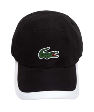 100% Polyester. Marke: Lacoste. Gewebe: Microfaser. Design: Logo. Gewebetechnik: Atmungsaktiv, Leicht. Kontrast Sandwich Spitze, Mit gebogenem Rand, Mit umstickten Ösenlöchern. Verstellbarer Gurt.