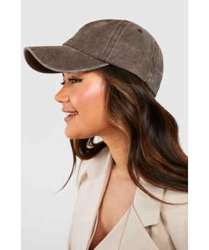 Classic baseball cap silhouette
        Soft, textured fabric for comfort
        Adjustable strap for a customised fit
        Curved brim for sun protection
        Versatile design suitable for various casual outfits
    
    This baseball cap is the perfect accessory to add a touch of laid-back cool to your everyday look. Its classic design makes it a versatile piece that can be styled with a multitude of casual outfits. Pair it with your favourite jeans and a crisp white tee for a timeless ensemble, or throw it on with a flowy sundress for a chic contrast. The cap is ideal for those relaxed weekend brunches, casual shopping trips, or lazy days in the park. Its practical design also makes it a great choice for outdoor activities or when you're running errands. The adjustable strap ensures a comfortable fit, while the curved brim offers protection from the sun. Whether you're aiming for an effortlessly stylish look or need a functional accessory for your day out, this baseball cap is your go-to choice for adding that final touch to your casual wardrobe.