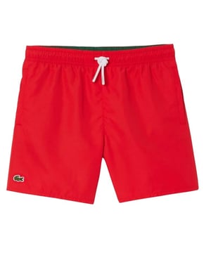 100% Polyester. Gewebe: Taft, Gewebe. Design: Gesticktes Logo, Unifarben. Taschenart: Zwei Seitentaschen. Gewebetechnik: Leicht, Schnell trocknend. Taille: Kontrastfarbene Durchzugskordel, Elastisch. Futterstoff: Netzmaterial.