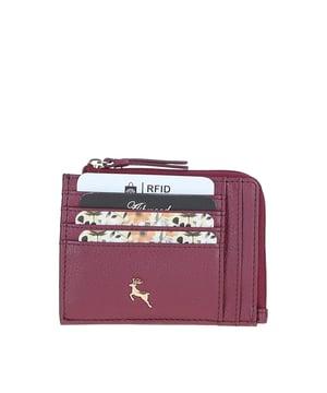 The Ashwood Leather Small Purse is perfect for everyday use, featuring 8 card holders, 2 slip pockets on each side, and a secure zip pocket for coins and valuables. Adorned with the elegant Ashwood metallic golden deer logo and golden zip, this purse offers a luxurious look while providing RFID protection to keep your cards safe. Fully lined with Ashwood branded lining, it combines functionality with a touch of elegance. Dimensions: (L) 12cm x (H) 9cm.