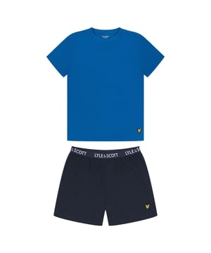Materiaal: Katoenmengsel. Stof: Jersey. Ontwerp: Geborduurd logo. Taille: Gebrandmerkt, Elastisch. Hals: Crew Neck. Mouwtype: Korte mouwen. Sluiting: Pull Over, Pull-On. Inhoud: 1 korte broek, 1 T-shirt. 6-8 jaar: 26 in. 8-10 jaar: 27 in. 10-12 jaar: 29 in. 12-14 jaar: 32 in.