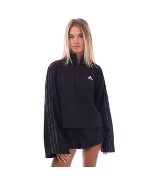 Comfort is in full bloom. A soft cotton blend in cosy fleece makes this adidas hoodie a perfectly fresh pick for everyday wear. It fits nice and relaxed to give you total freedom of movement  while a half-zip with stand-up collar and hood offer practicality with attitude. An abstract floral design fills the 3-Stripes with a pop of optimism.A minimum of 70% of this product is a blend of recycled and renewable materials.A heavyweight hoodie made with a blend of recycled and renewable materials.Half zip with stand-up collar and hoodSide pocketsGraphic 3-StripesLoose fit78% cotton  22% recycled polyester fleece.