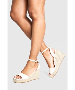 We'll make sure your shoes keep you one stylish step ahead of the crowdWhether you're keeping it simple in sliders, living the high life in heels or joining the fash pack in flatforms, you'll be heading to shoe heaven with our fashion-forward footwear collection. Boots are your day-to-night bestfriend, giving a floral dress&nbsp;that tough twist - add a biker jacket for even more attitude. Find your summer feet in jelly sandals and enjoy balmy nights in block heels.