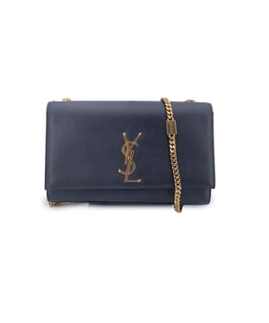 VINTAGE, RRP AS NEW
This beautiful item will come with a Certificate of ity provided by Entrupy. The certificate will be provided at no further cost  Elegant and unmistakably iconic, the Saint Laurent K'ate - Medium' Shoulder Bag is a refined evening companion that embodies the spirit of timeless Parisian glamour. Crafted in sleek black leather, this shoulder bag features a classic flap design secured with a hidden magnetic button closure, creating a smooth, uninterrupted silhouette.  At the heart of the design is the striking gold metal YSL monogram - a bold, sculptural statement that instantly elevates any look. A luxurious gold metal chain strap adds both shine and versatility, allowing the bag to be worn gracefully over the shoulder or across the body. For added functionality, the strap can be removed entirely, effortlessly transforming the bag into an elegant clutch - perfect for more formal occasions or a minimalist evening look.  Inside, the shoulder bag is lined in grosgrain fabric and includes a single open pocket for your essentials. Subtle branding Condition Rating: A - EXCELLENTCondition Details: Gently Used. Minimal wear of use on the reverse of the flap. Please check the images carefully. Please ask if you need to know more details or if you have any doubts.Measurements (cm):Depth: 3.8Height: 12.7Length: 26.7Other Details: Dustbag? YesKeys? NoBox? No Measurments:  width: 38 mm length: 267 mm height: 127 mm strap length: 0 mm handle drop: 0 mm