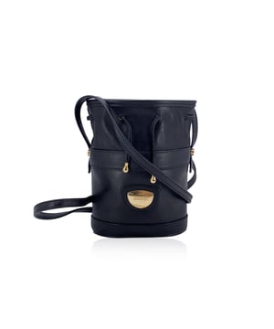 VINTAGE, RRP AS NEW
A true gem for lovers of vintage luxury, this Gucci mini drawstring bucket bag in supple black leather is a timeless piece that speaks to the quiet elegance of early-era Gucci. Its compact silhouette is accentuated by a classic drawstring closure, making it effortlessly chic yet practical.  What sets this beauty apart is the gold metal Gucci shield tab on the front-a small but striking emblem of the brand's heritage. Inside, you'll find a soft beige lining, a handy side open pocket, and the unmistakable 'Gucci Italy' crest tag, a mark of ity and craftsmanship. The thin leather shoulder strap adds a graceful touch, perfect for carrying just the essentials with vintage flair.  This is more than a bag-it's a stylish echo from Gucci's storied past. Condition Rating: A - EXCELLENTCondition Details: Gently used. Minimal wear of use on the internal lining. Please check the photos carefully and ask if you need to know more details or if you have any doubts.Measurements (cm):Depth: 6.4Height: 17.8Length: 14.0Other Details: Dustbag? NoKeys? NoBox? No Measurments:  width: 64 mm length: 140 mm height: 178 mm strap length: 0 mm handle drop: 0 mm