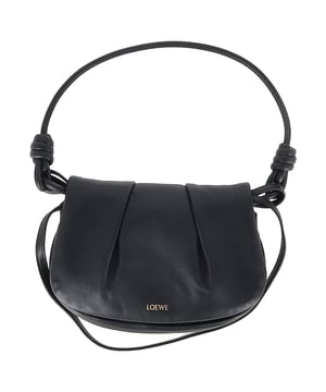 VINTAGE, RRP AS NEW
The Loewe Paseo Shoulder Bag in black nappa leather showcases understated luxury with its soft, pleated silhouette and buttery-smooth texture. Expertly crafted in Spain, it features elegant knot details and a spacious interior for everyday sophistication. **Style tip:** Carry it with monochrome tailoring or a flowing midi dress to emphasize its modern, sculptural beauty.

 Loewe Paseo Shoulder Bag in Black Nappa Leather

Condition: Excellent
Signs of wear: No retail tag, No visible sign of wear., 
Packaging: None
Color: Black
Material: Leather | nappa calf leather
Size: One Size | One Size
Measurements: Width: 50; Height: 160; Length: 260
SKU: NAPPUGBBA525440W