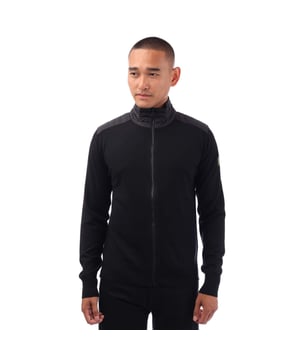 Stand-up collar.Two-way zip centre front closure.Ribbed cuffs and hem.Channel quilted shoulder reinforcement detailing.Belstaff phoenix patch on left sleeve.Virgin Merino wool with polyester detailing.