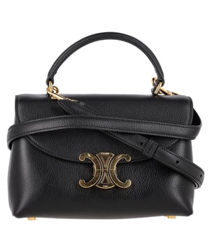 VINTAGE, RRP AS NEW
The Celine Teen Nino Top Handle Bag in black calf leather is a refined expression of Parisian minimalism, featuring clean lines and a structured silhouette. Crafted from smooth, luxurious leather, it’s the perfect size for daily essentials while exuding timeless elegance. **Style tip:** Pair it with a tailored blazer and high-waisted jeans for a polished, effortlessly chic daytime look.

Celine Teen Nino Top Handle Bag in Black Calf Leather

Condition: Excellent
Signs of wear: No retail tag, No visible sign of wear., 
Packaging: Dust bag
Color: Black
Material: Leather | calfskin leather
Size: One Size | One Size
Measurements: Width: 70; Height: 130; Length: 210; Handle drop: 70; Strap length: 0
SKU: NAPPUGBBA525441W