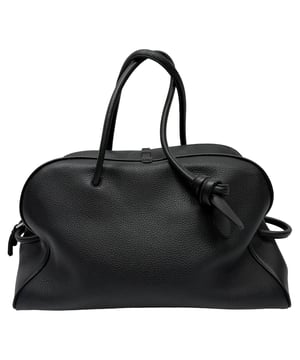 VINTAGE, RRP AS NEW
Travel in style with the Jacquemus Le Grand Turismo Holdall Weekend Bag, crafted in sleek black leather for a refined, minimalist aesthetic. Its structured silhouette, top handles, and subtle logo detailing make it both functional and fashion-forward. Pair it with a tailored coat, slim trousers, and leather sneakers for a polished weekend getaway look that speaks effortless sophistication.

 Jacquemus Le Grand Turismo Holdall Weekend Bag in Black Leather

Condition: Excellent
Signs of wear: No visible signs of wear
Packaging: None
Color: Black
Material: Leather | calfskin leather
Size: One Size | One Size
Measurements: Handle drop: 600 mm; Strap length: 00; Width 210 mm Height 290 mm Length 500 mm 
SKU: MRPPUGBBA531180M